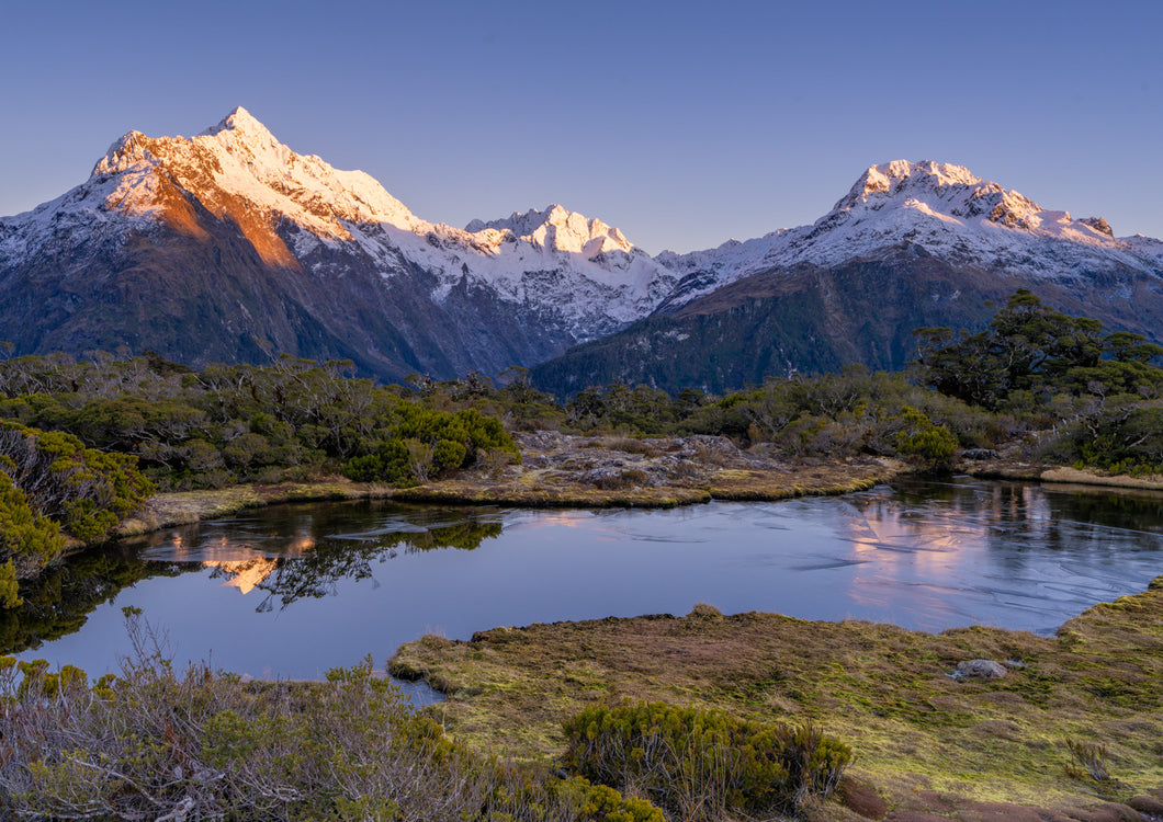 key summit sunrise light fiordland