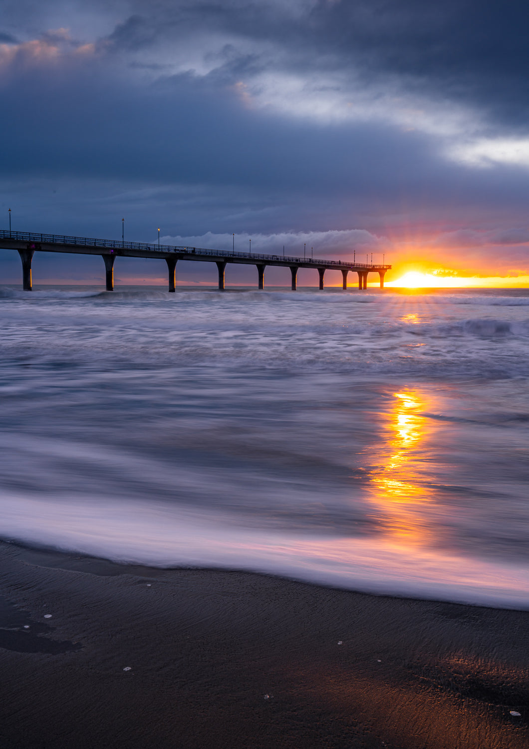 new brighton pier dawn waves christchurch